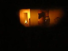 looking my wife through the window with her bull.